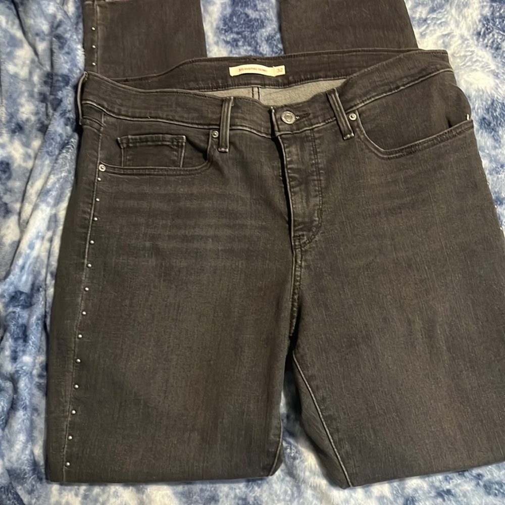 Black Levi jeans w beading down the side